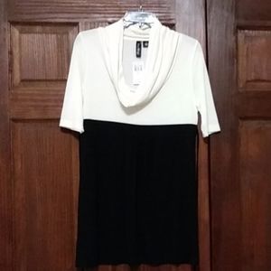 Cream and black 3/4 lemgth sleeve dress.